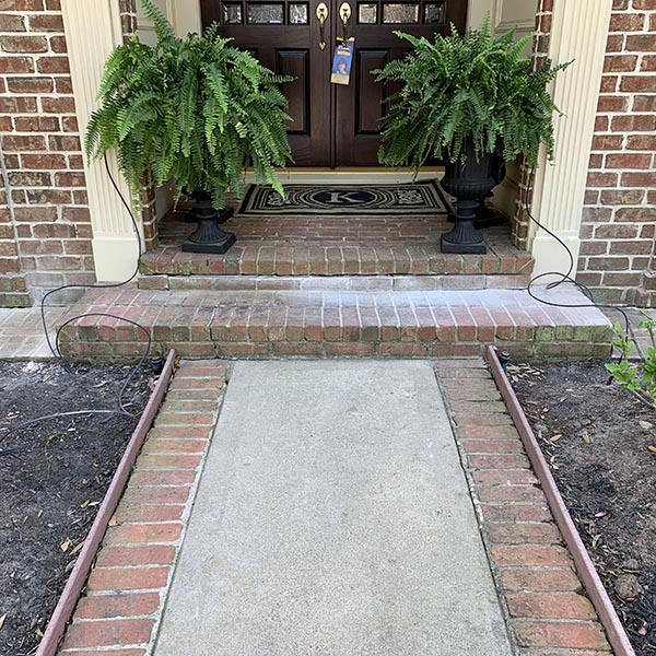 Sunken patio concrete before lifting and repair