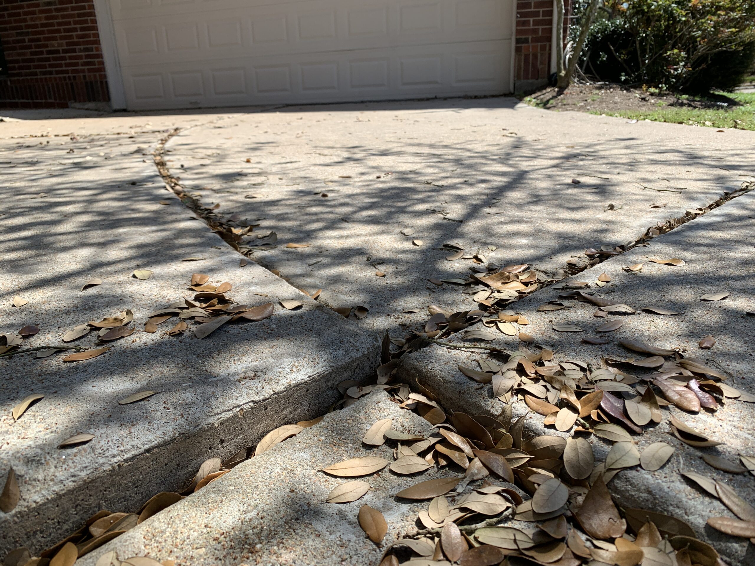 Uneven driveway before lifting