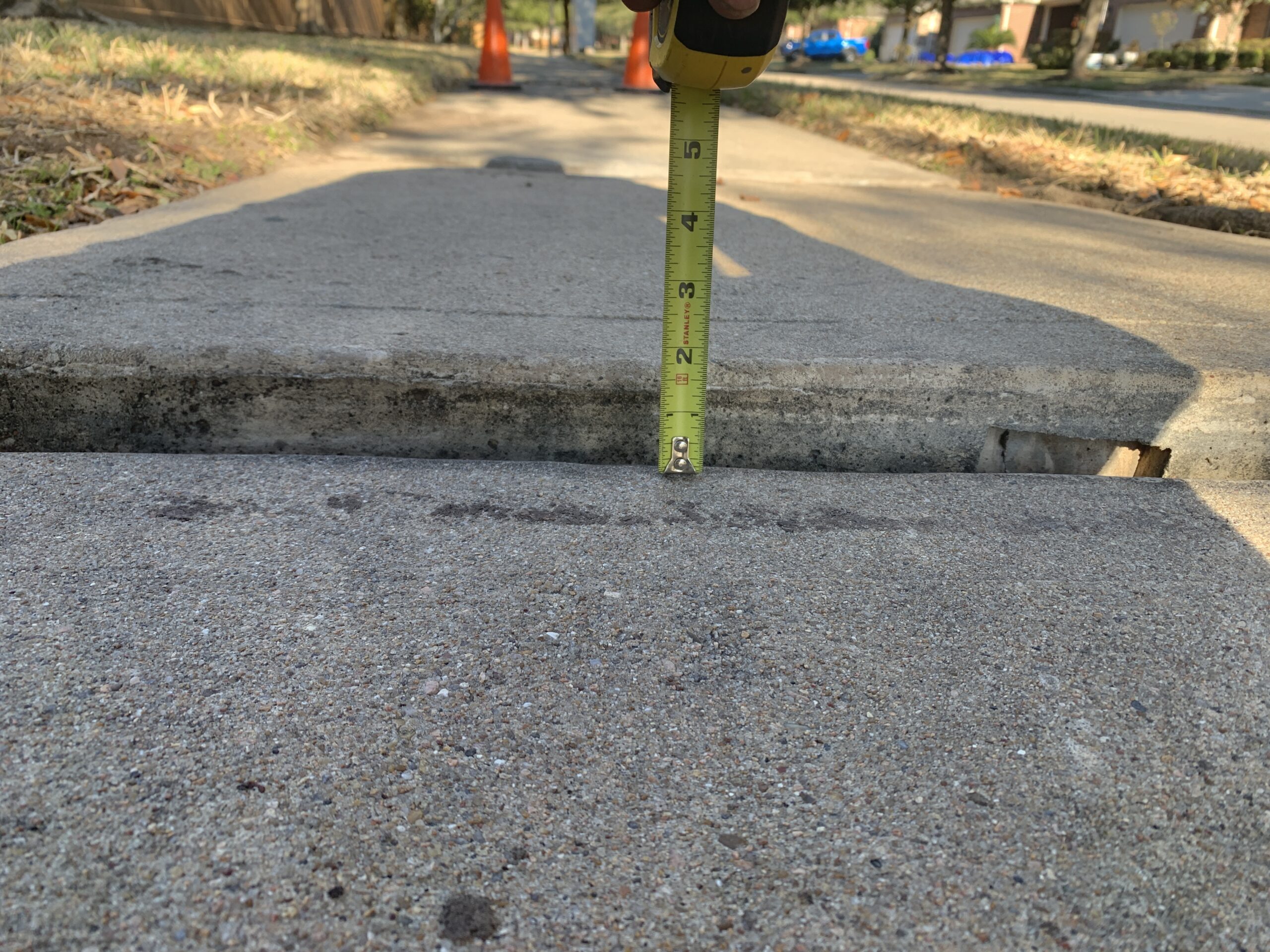 Uneven sidewalk before lifting in League City TX